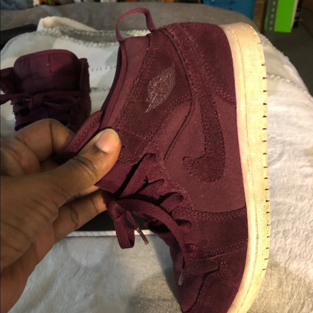 Girls maroon Jordan tennis shoes